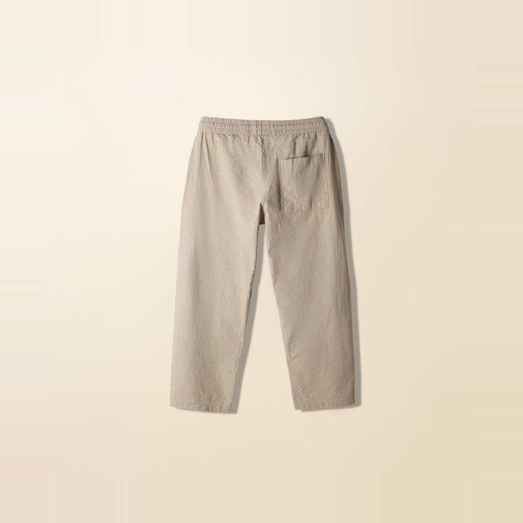 LNX Easy Pant in Sand, back view, flat lay product photo