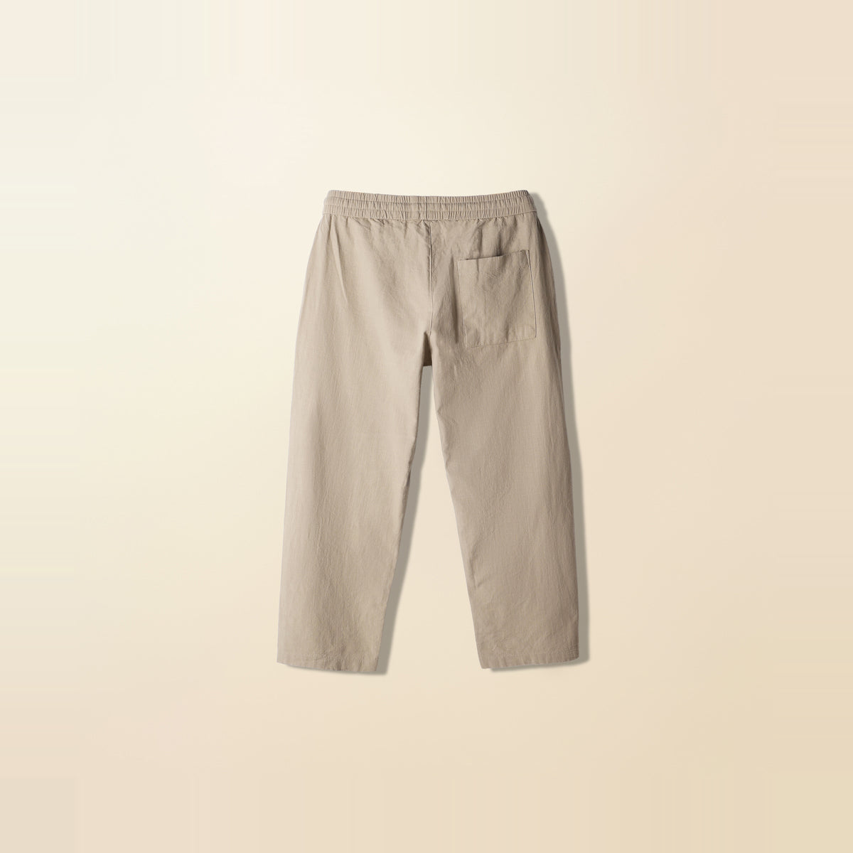 LNX Easy Pant in Sand, back view, flat lay product photo